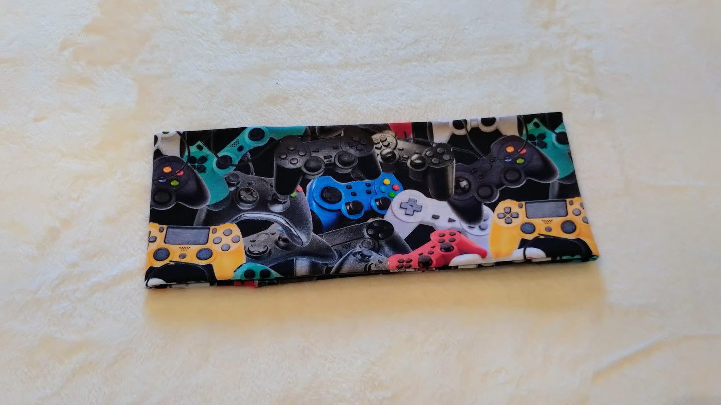 Pannebånd med spillkontrollere. Størrelse Voksen XL.