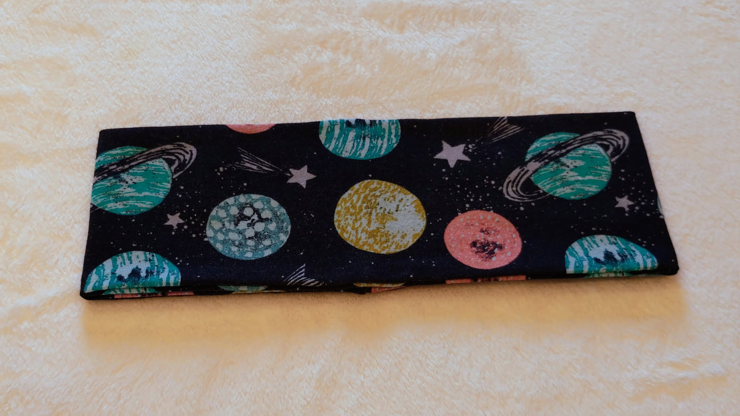 Pannebånd med planeter. Størrelse 4år-10år.