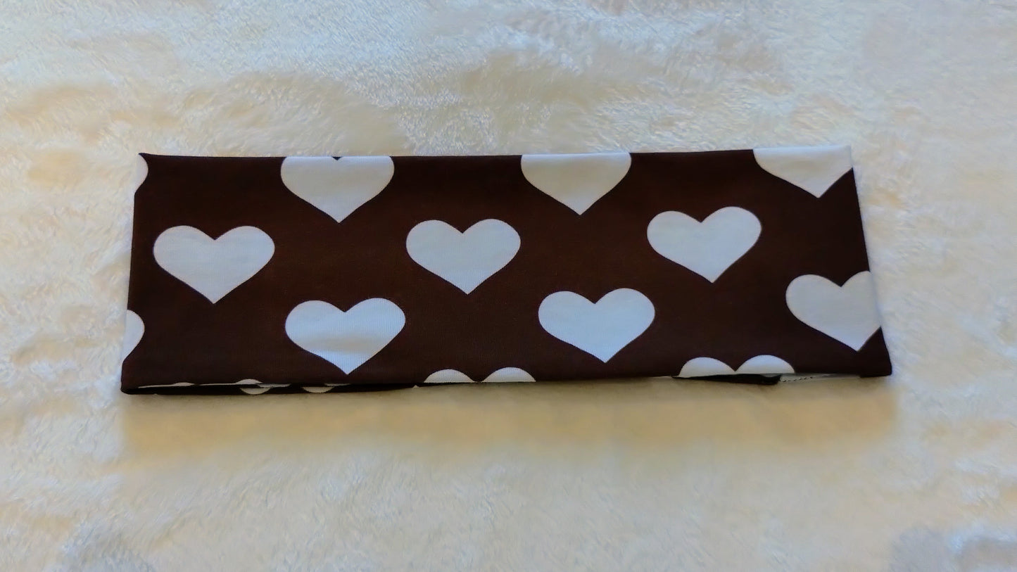 Pannebånd med pepperkakehjerter. Størrelse 11år-Voksen.