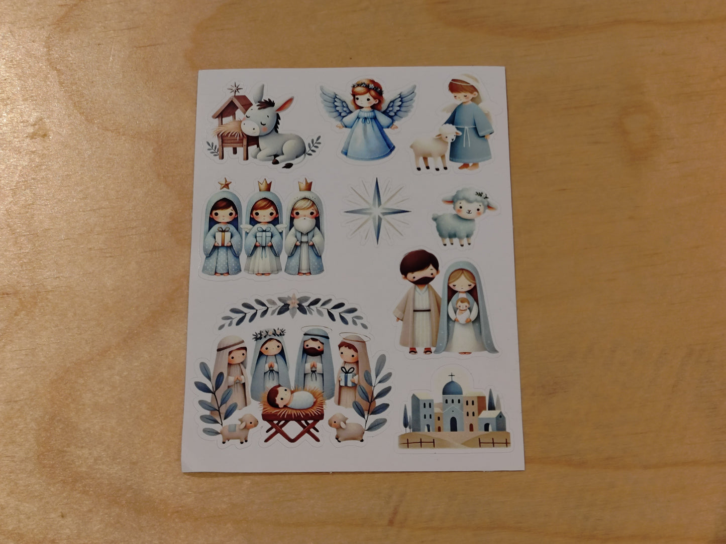 Klistremerkeark med julekrybbemotiv