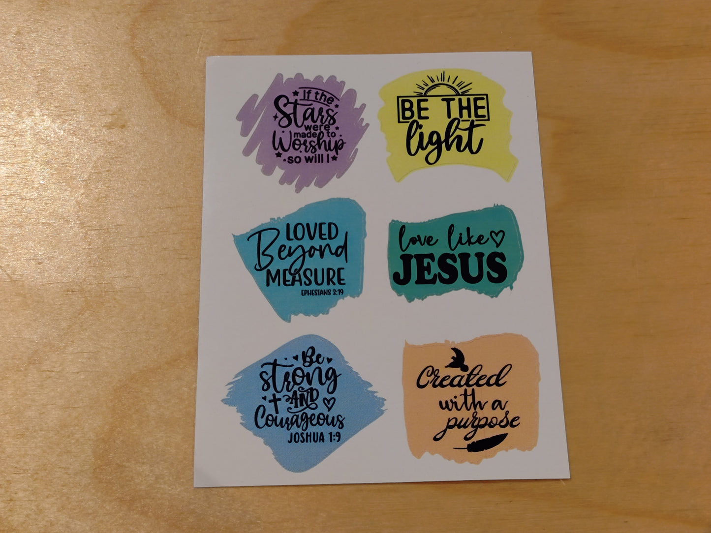 Klistremerkeark med kristent innhold